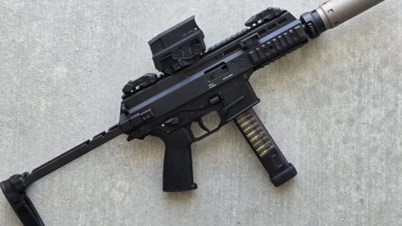 B&T APC9 PRO 9mm submachine gun with mounted optic and accessory rails