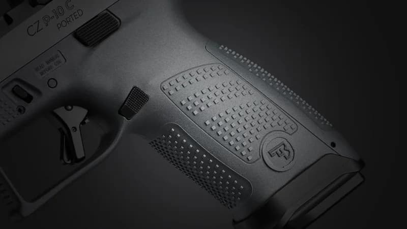 CZ P-10 C Ported grip texture close-up showing DiFEND ergonomic pattern, checkering, and CZ logo