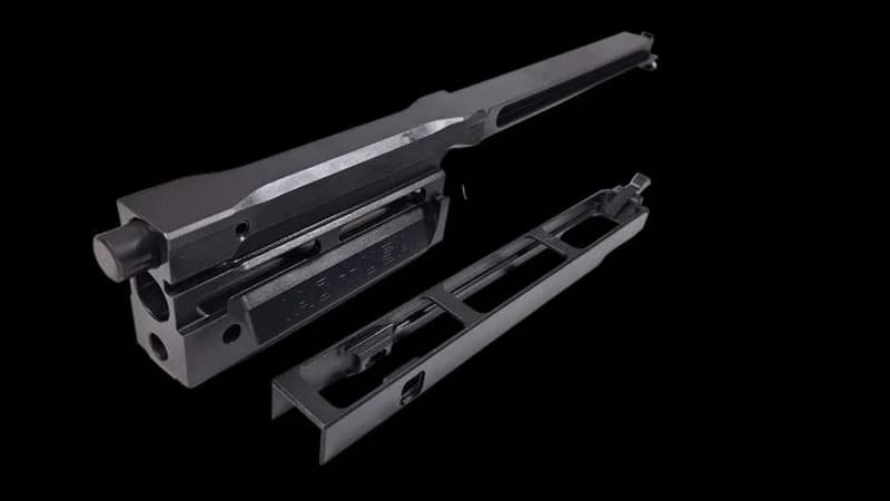 Buffered bolt carrier for FN SCAR showing hydraulic buffer design