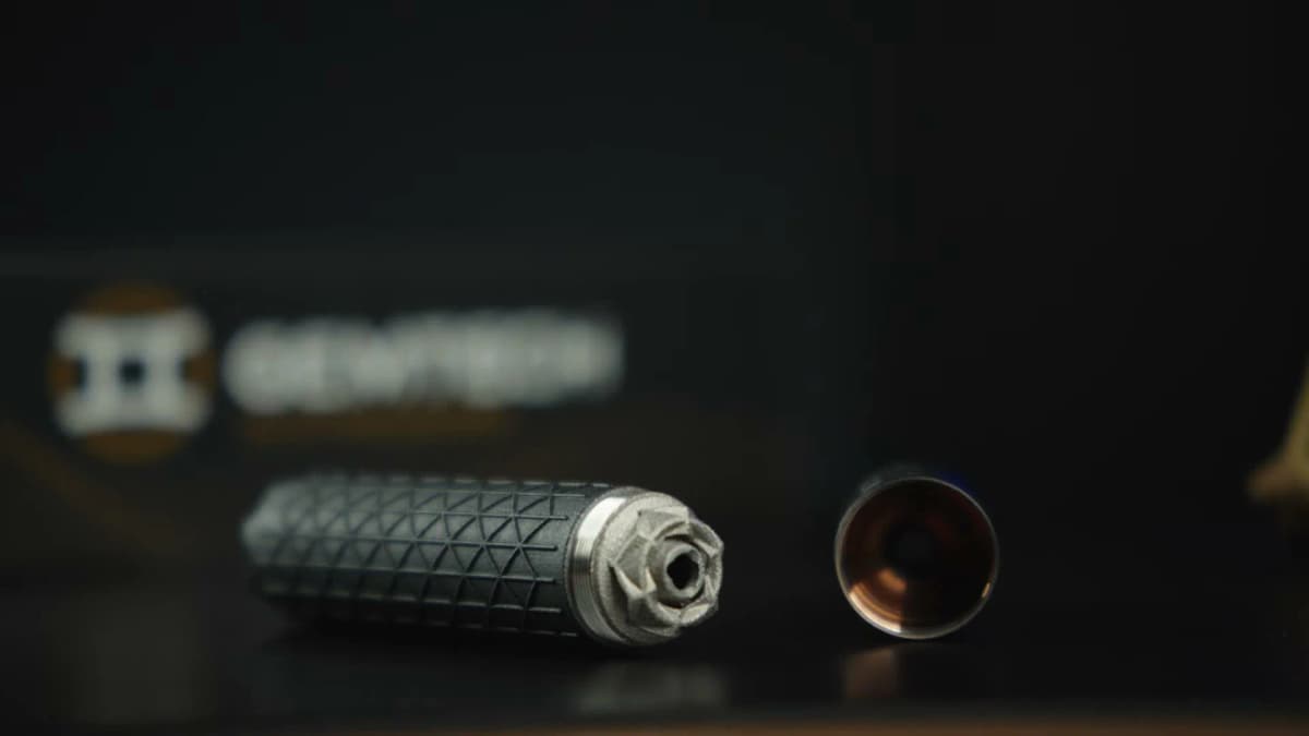 Gemtech Nebula 5.7 disassembled showing 3D-printed titanium baffle stack