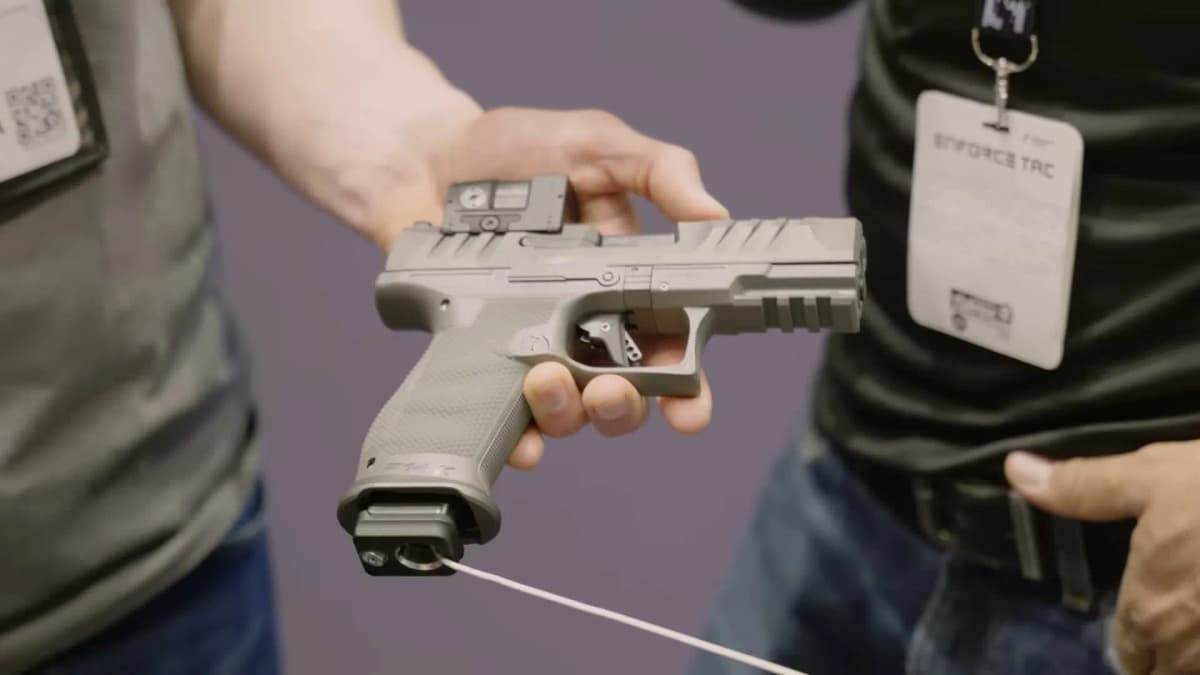 Walther P14K compact variant in grey finish showing shortened barrel and grip compared to the full-size P14