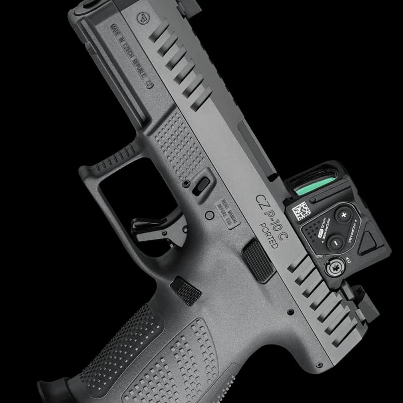 CZ P-10 C Ported COA tilted view showing Aimpoint COA controls, slide serrations, and grip texture