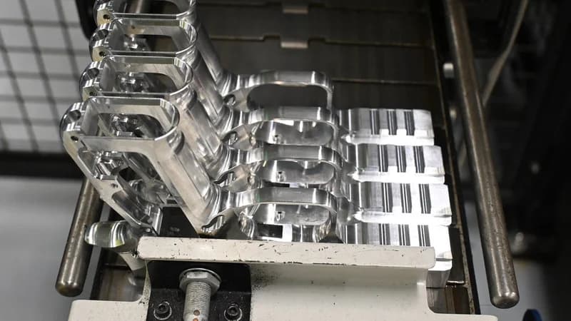 Row of CZ pistols on an assembly bench inside the CZ factory in Uhersky Brod, Czech Republic