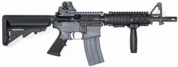 U.S. Navy MK18 Mod 0 CQBR with KAC M4 RAS quad rail, Aimpoint optic, and vertical foregrip