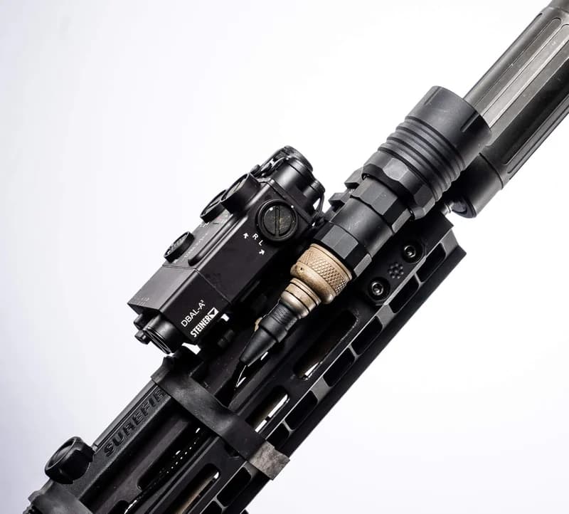 Modlite OKW weapon light mounted on an AR-15 rifle handguard