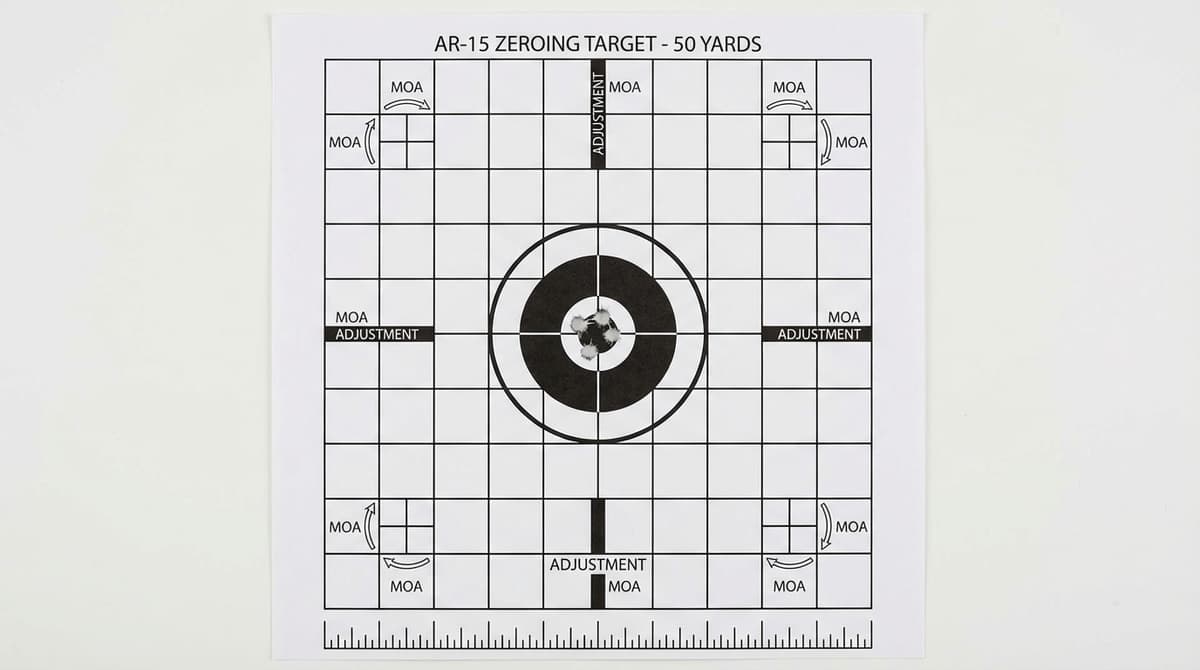 Zeroing target with grouped bullet holes