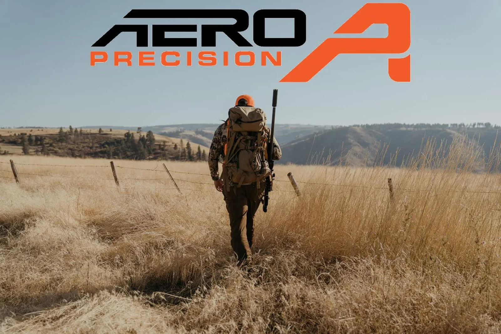 Aero Precision logo above a hunter walking through open grassland