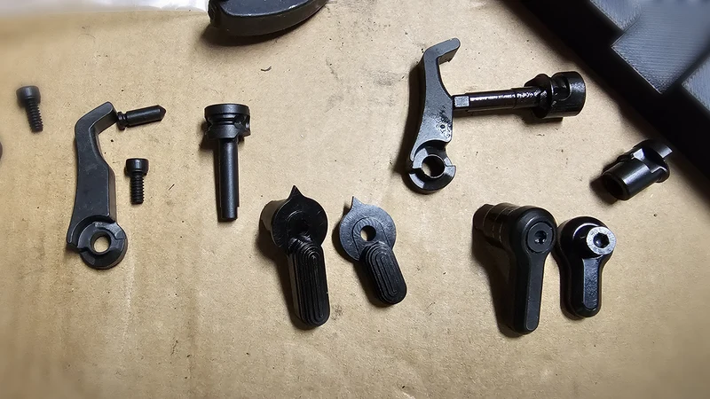 A.S. Designs Arc-Fire V2 parts laid out next to the V1 for comparison
