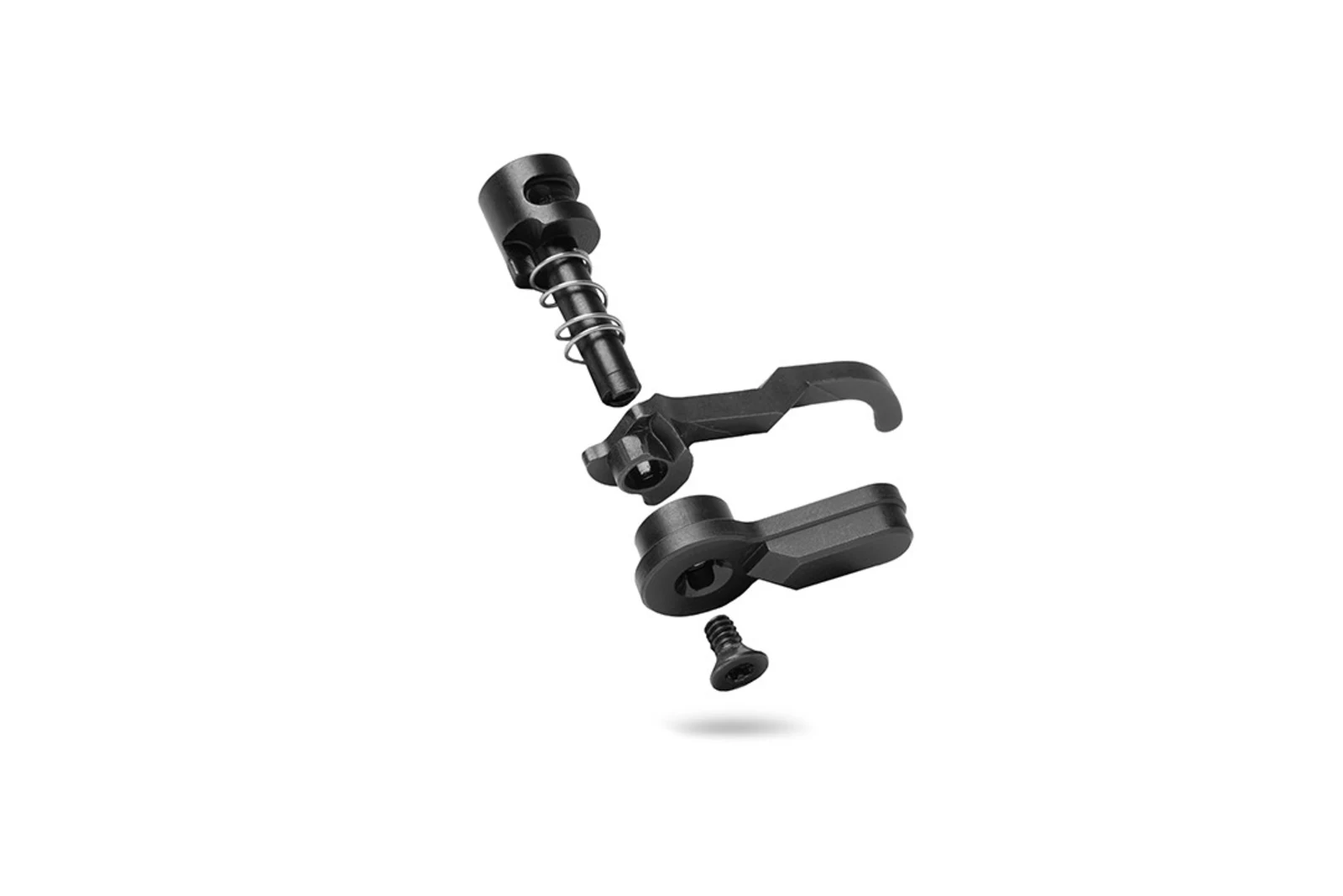 Exploded view of the Atrius forced reset selector showing the selector body, detent, spring, cam lever, and paddle