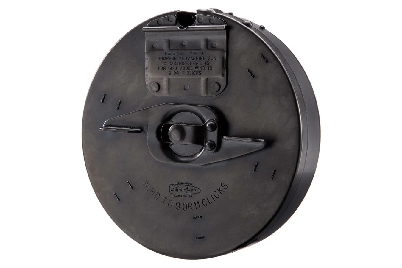 Rear face of an Auto-Ordnance Thompson Type L 50-round .45 ACP drum magazine, showing the winding key, latch, and stamped loading instructions