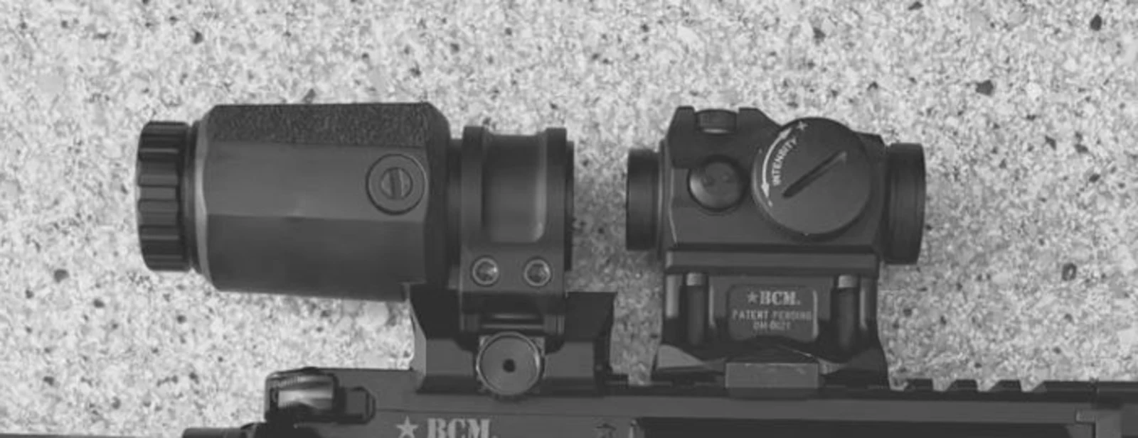 Detail of the optic setup on Kyle Defoor's BCM9, showing a micro red dot in a BCM mount with a flip-to-side magnifier behind it