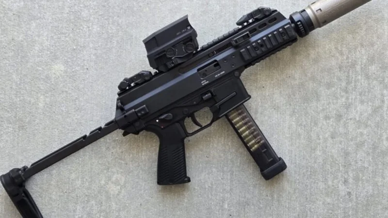 B&T APC9 PRO 9mm submachine gun with mounted optic and accessory rails