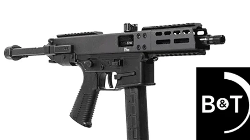 B&T GHM9 Retro submachine gun showing the top-mounted charging handle and retro-style furniture