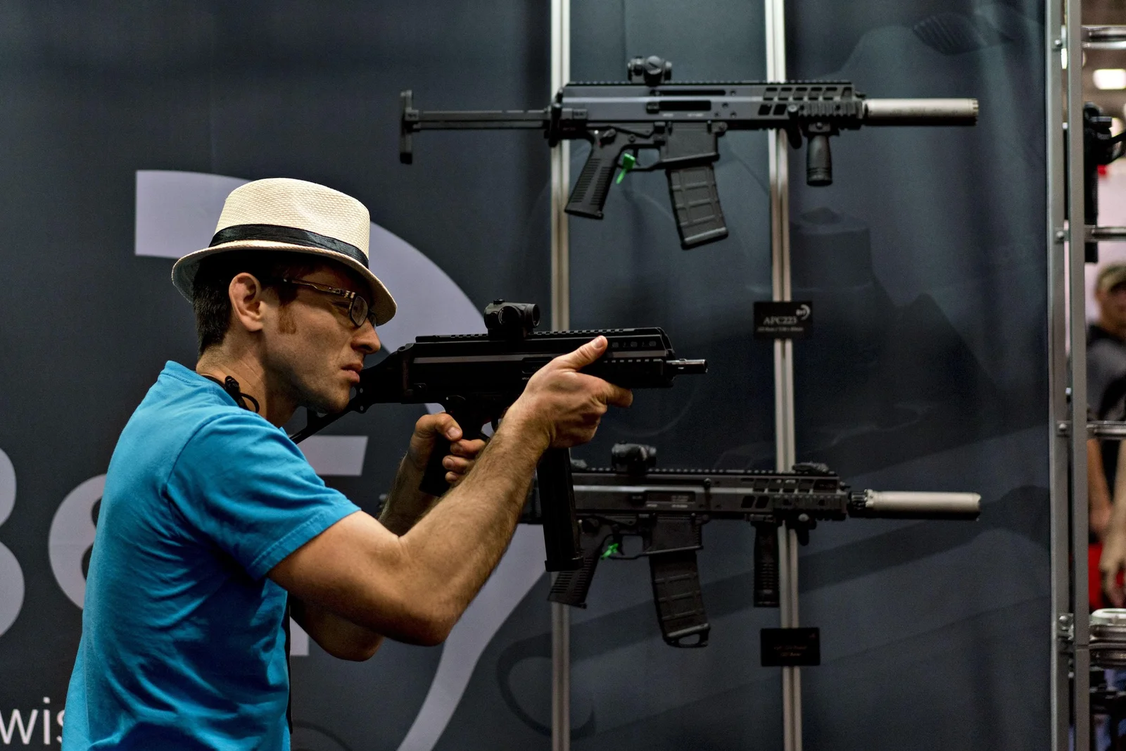 B&T firearms displayed at an industry exhibition wall
