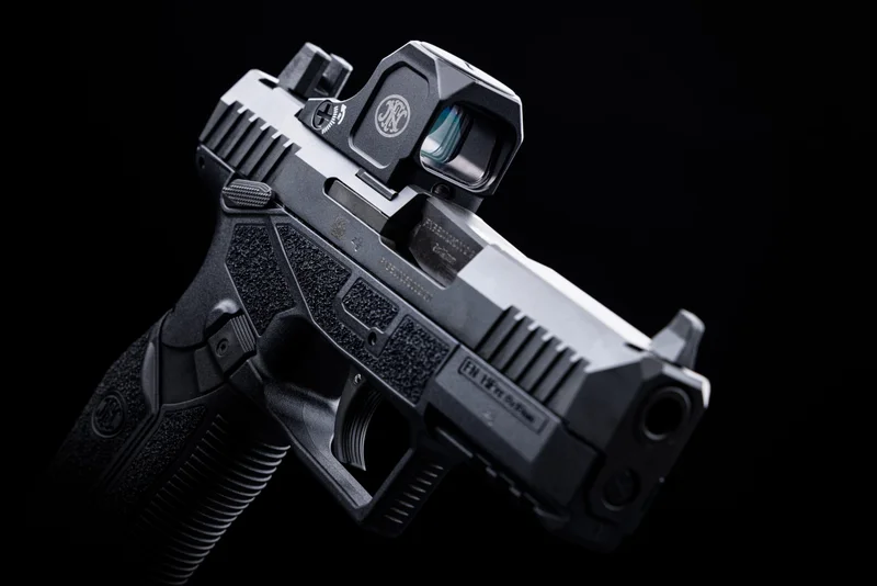 FN PUREVIEW holographic micro red dot sight mounted on an FN pistol slide