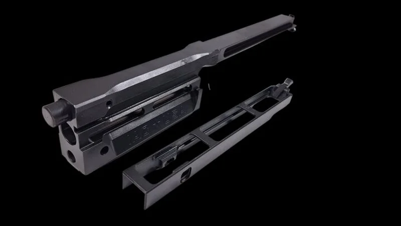 Buffered bolt carrier for FN SCAR showing hydraulic buffer design