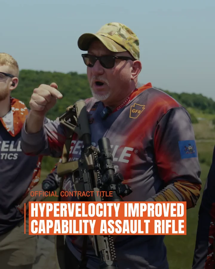 Bill Geissele presenting the HICAR prototype at a shooting match with the official contract title Hypervelocity Improved Capability Assault Rifle overlaid