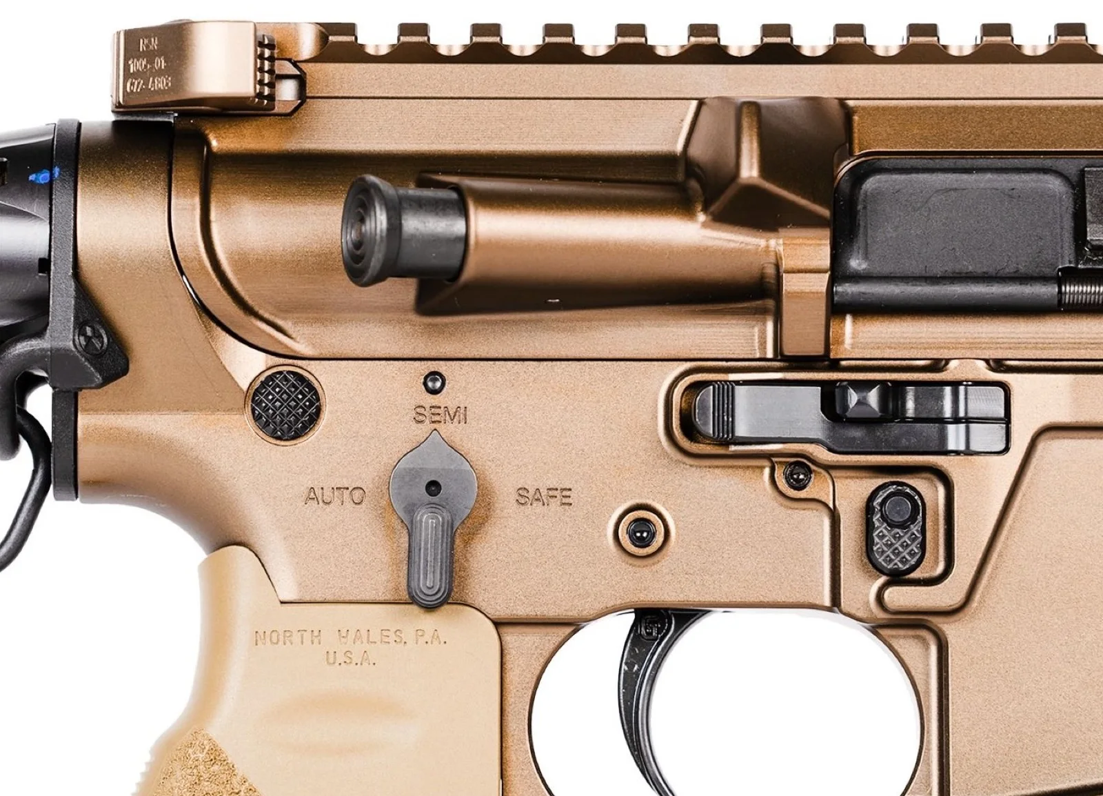 Close-up of the Geissele HICAR lower receiver showing a three-position selector marked SAFE, SEMI, and AUTO, an ambidextrous bolt release, and an Airborne Charging Handle stamped with an NSN