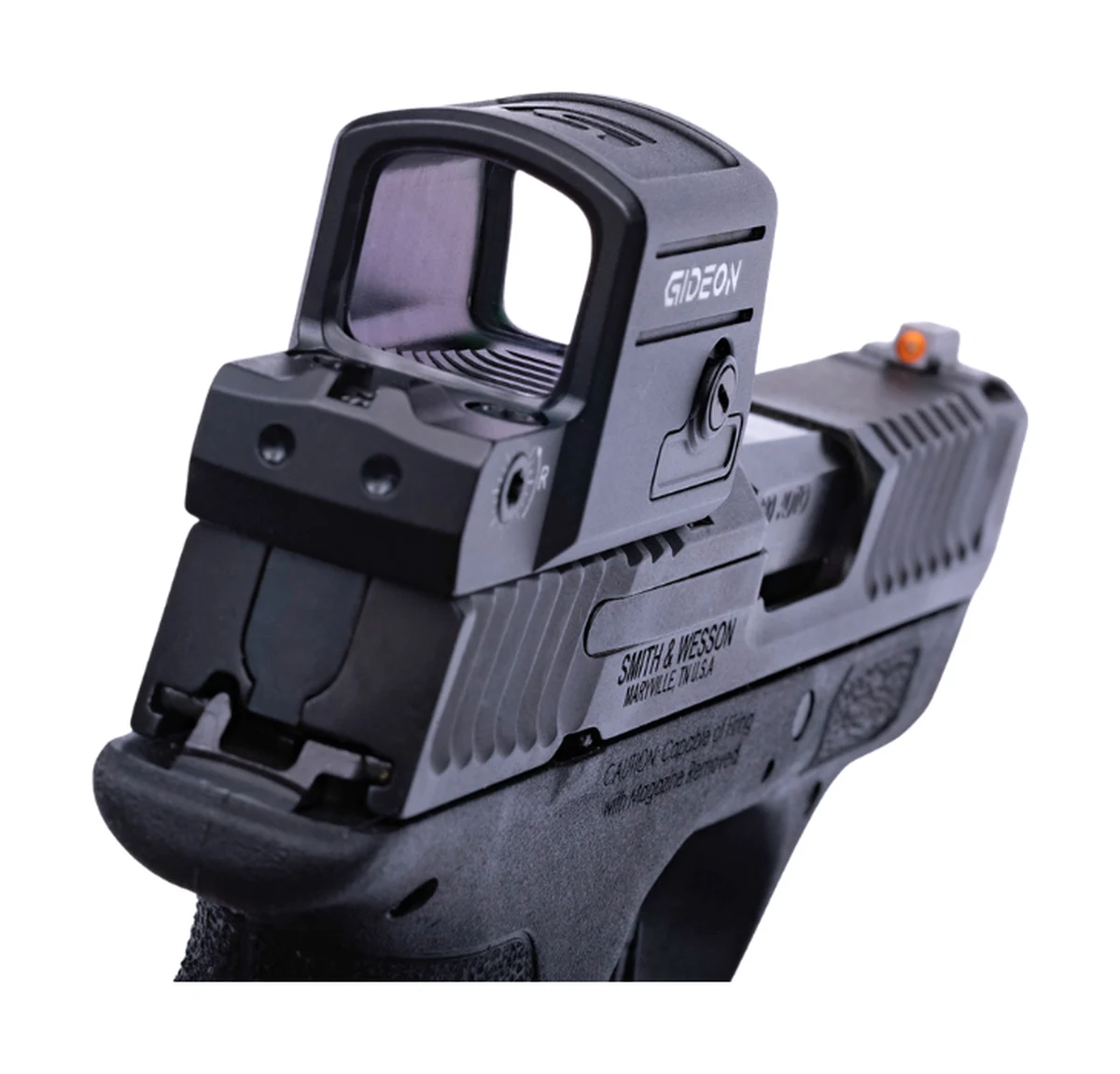 Close view of the Gideon Pebble E mount base clamped into the rear sight dovetail of a Smith and Wesson Bodyguard 2.0, with the windage screw and battery tray screw visible