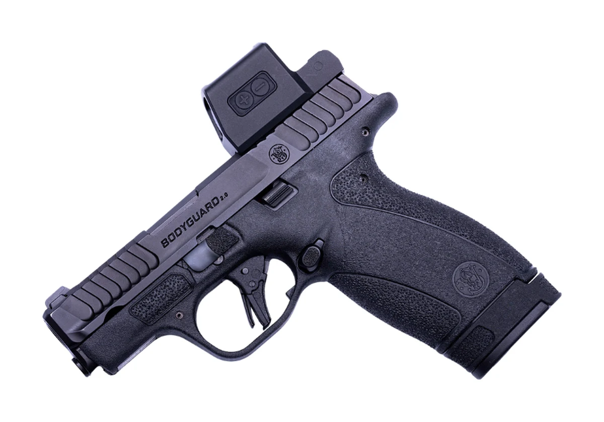 Gideon Optics Pebble E enclosed micro red dot mounted on a Smith and Wesson Bodyguard 2.0, right side profile with the extended magazine installed