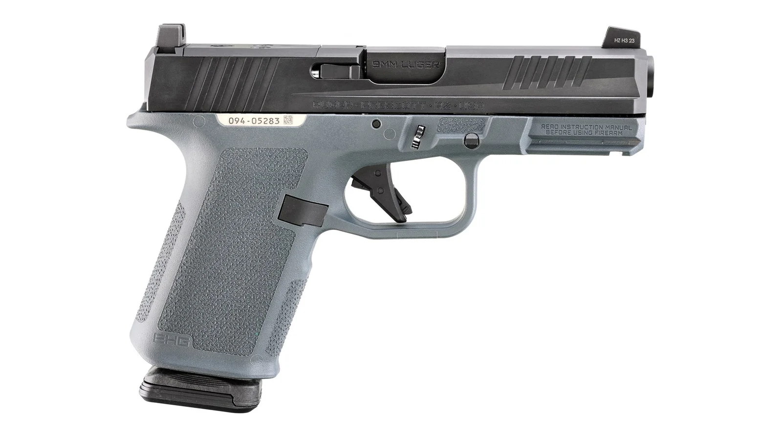 Ruger RXM 9mm pistol with grey Magpul grip module and black slide, showing the serialized fire control insert design