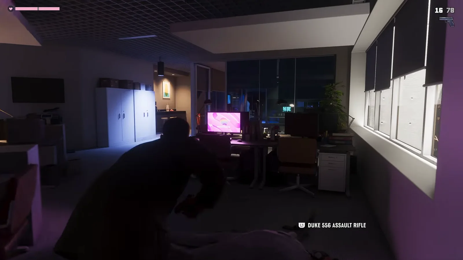 GTA 6 office gameplay with the on-screen pickup prompt Duke 556 Assault Rifle