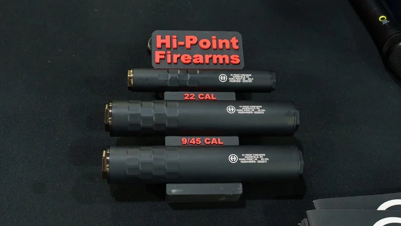 Hi-Point Hush-Point suppressor line on display including multi-caliber .30 and .45/9mm models