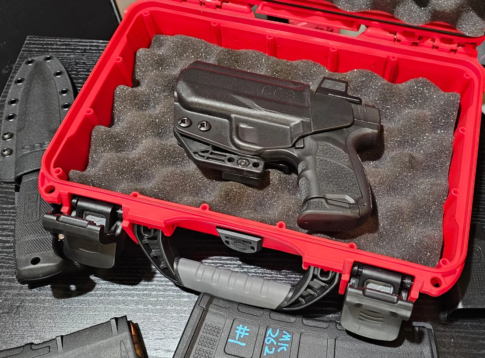 HK CC9 seated in a black PHLster kydex IWB holster