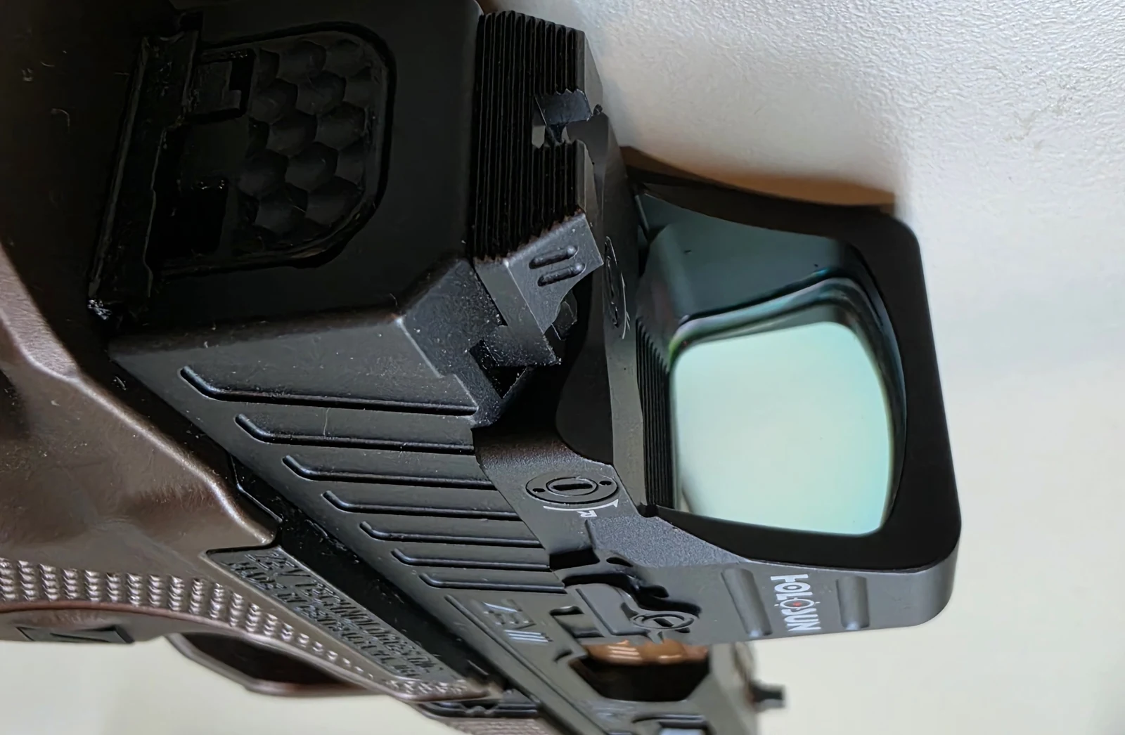 Angled view of the Holosun 507COMP on the ZEV slide showing the optic-to-slide interface