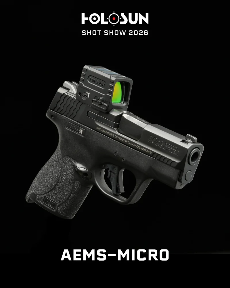 Holosun AEMS-MICRO mounted on S&W M&P Shield showing compact enclosed design