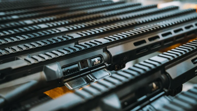 IWI rifles on a production rack at the company's manufacturing facility