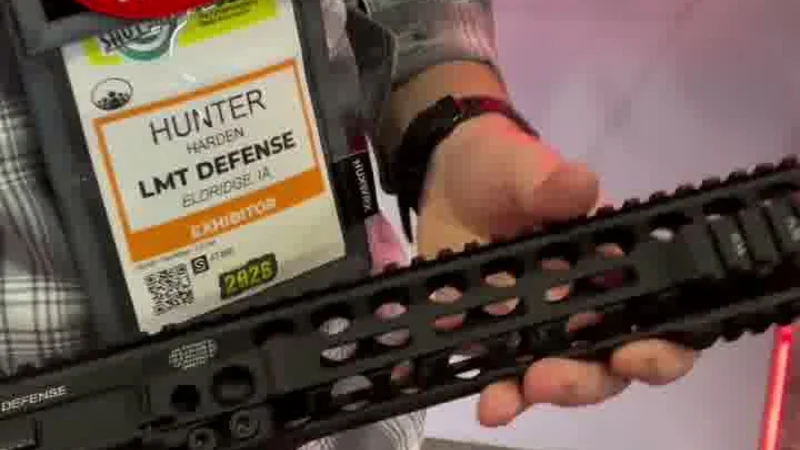 Close-up of LMT hybrid upper showing M-LOK slots on sides