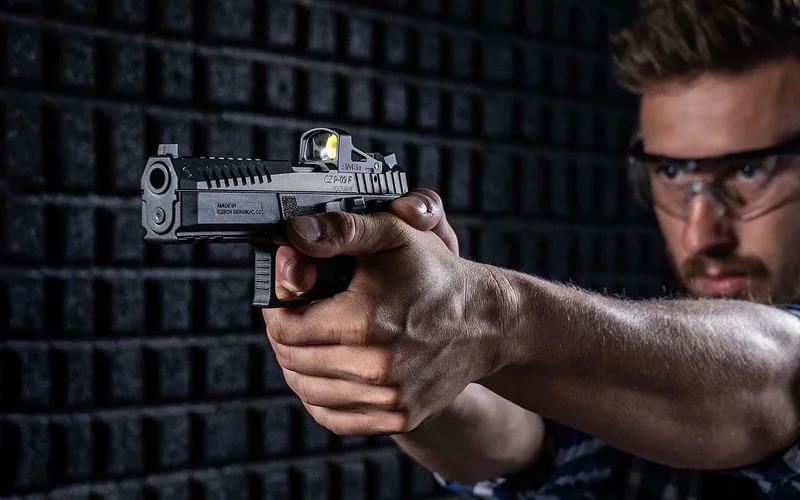 CZ P-09 F Nocturne full-size pistol with red dot optic mounted, showing the optic-ready slide and SIG dovetail backup sights