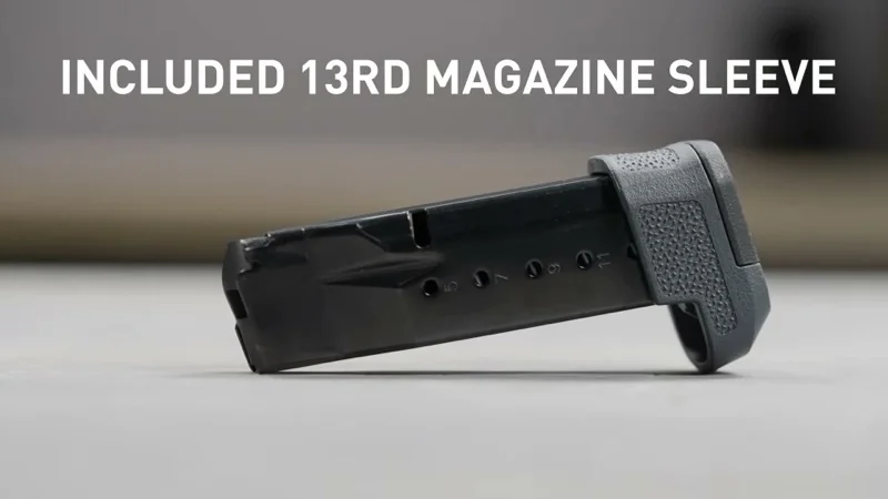 Macro shot of the included color-matching 13-round grip extension for the Magpul EHG RG380, showing TSP texture and the seamless extension of the grip frame