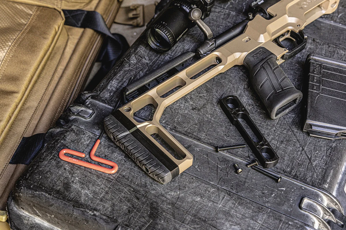 FDE MDT Stalker Core buttstock on a chassis rifle with the included hex L-key and mounting hardware laid out
