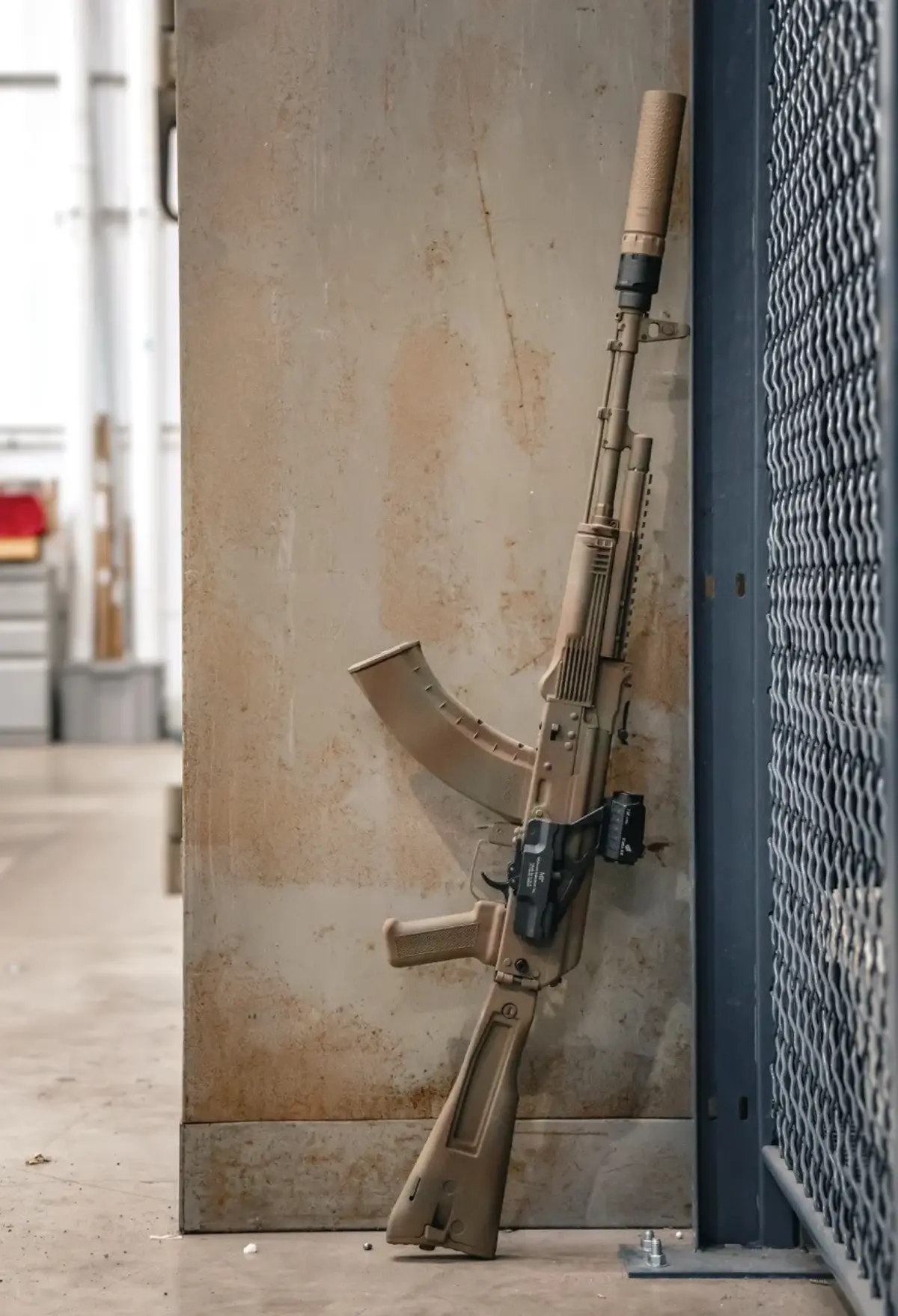 Meridian Defense Trench-103 rifle in Dubok Shadow Cerakote showing the brown-dominant woodland camouflage across the receiver, handguard, stock, and magazine