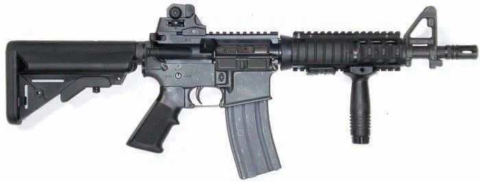 U.S. Navy MK18 Mod 0 CQBR with KAC M4 RAS quad rail, Aimpoint optic, and vertical foregrip
