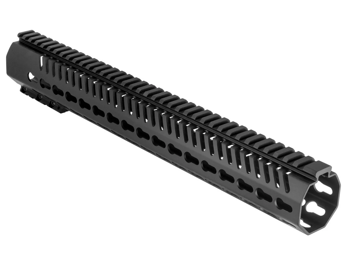 Black aluminum AR-15 handguard showing KeyMod keyhole slots, each a round hole opening into a narrower slot