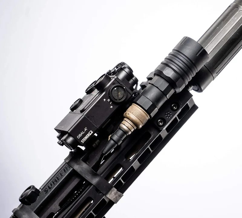 Modlite OKW weapon light mounted on an AR-15 rifle handguard