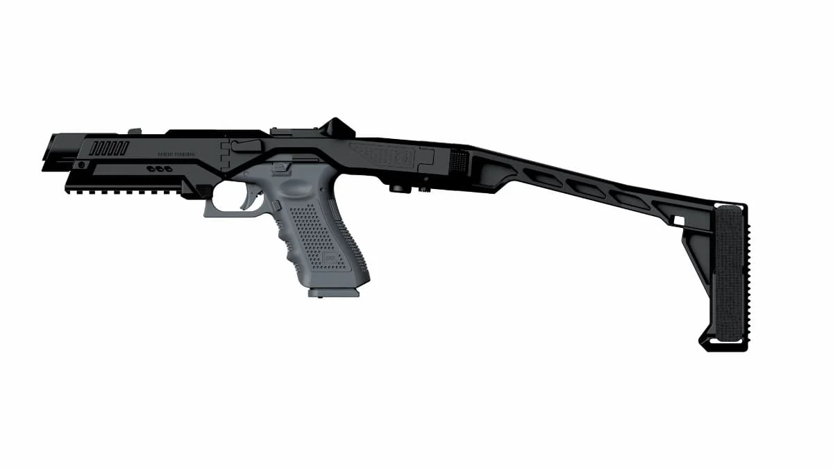 Side profile of the Nano Roni pistol conversion kit with a Glock inserted, showing the minimalist chassis and folding brace