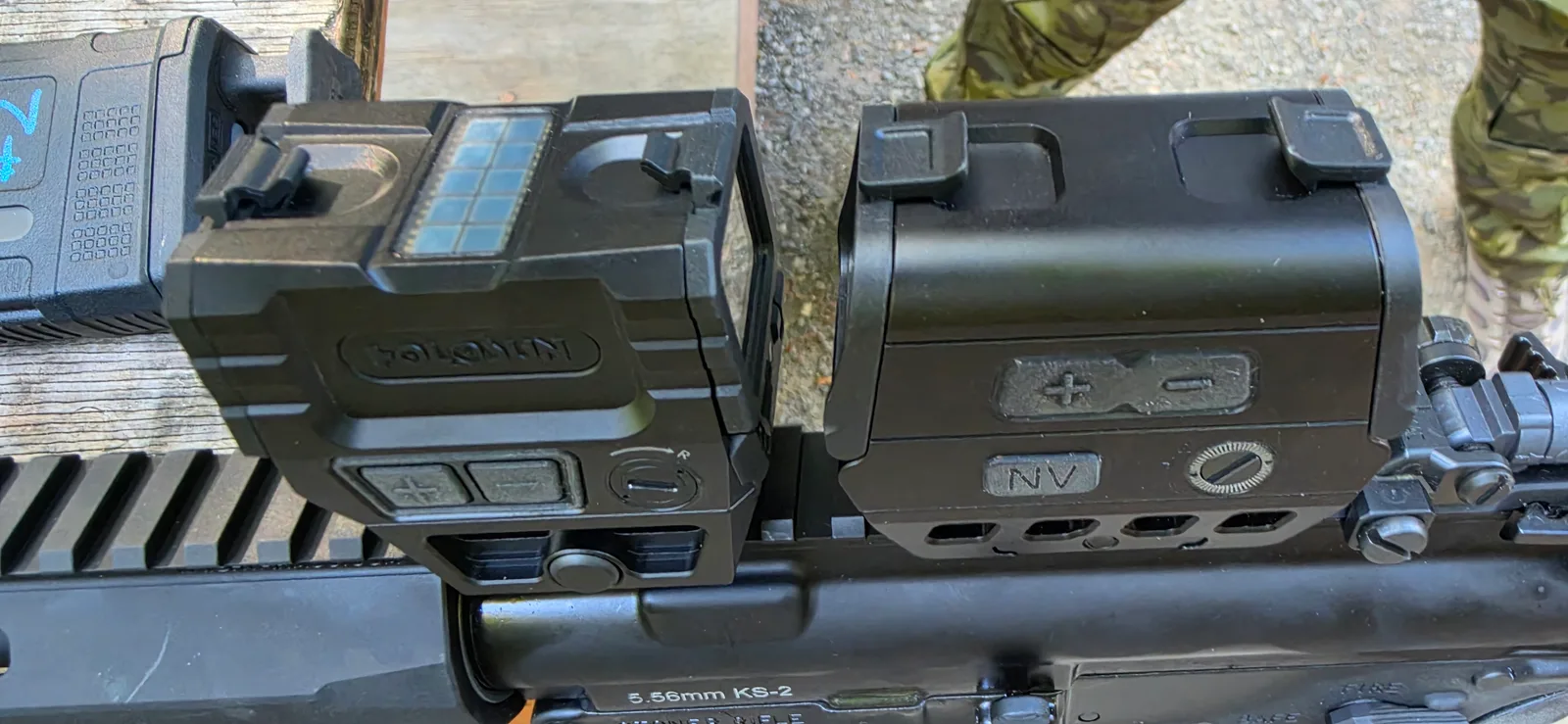 Control faces of the Holosun AEMS Pro X2 and the Osight R side by side, showing the Holosun's solar strip and two-button pad against the Osight's brightness rocker and NV button