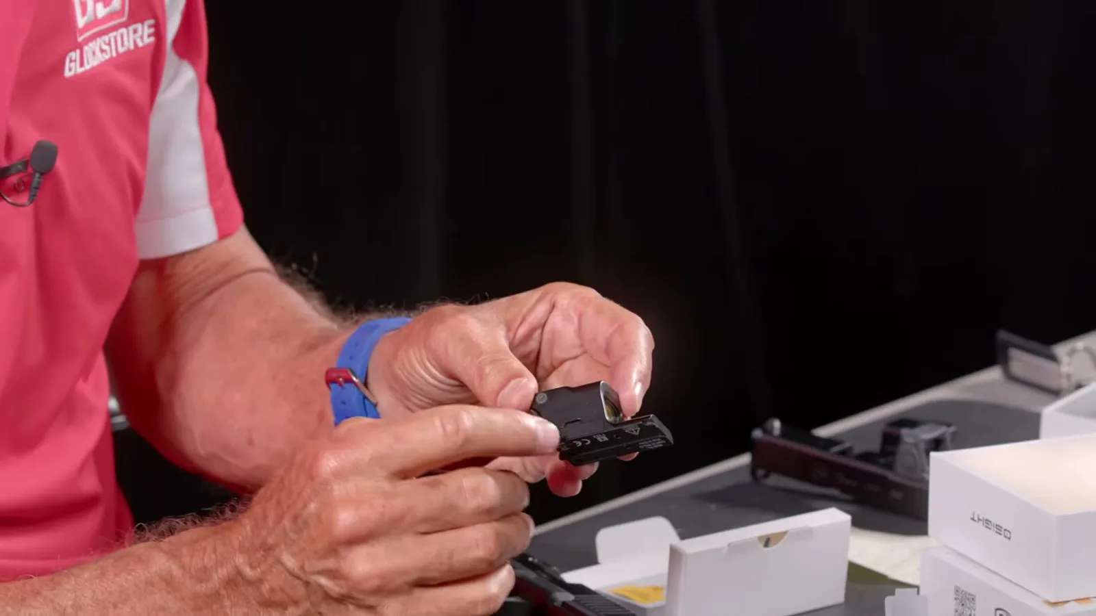 Close-up of the Osight SE MOS with the side battery tray pulled out of the housing
