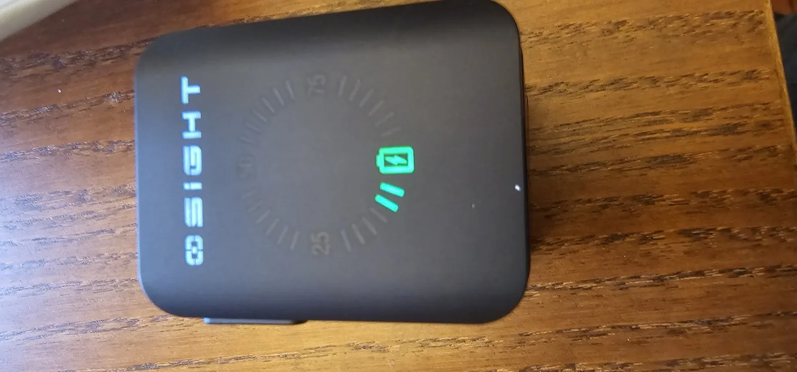 Magnetic charging cover showing the LED battery indicator with current charge level