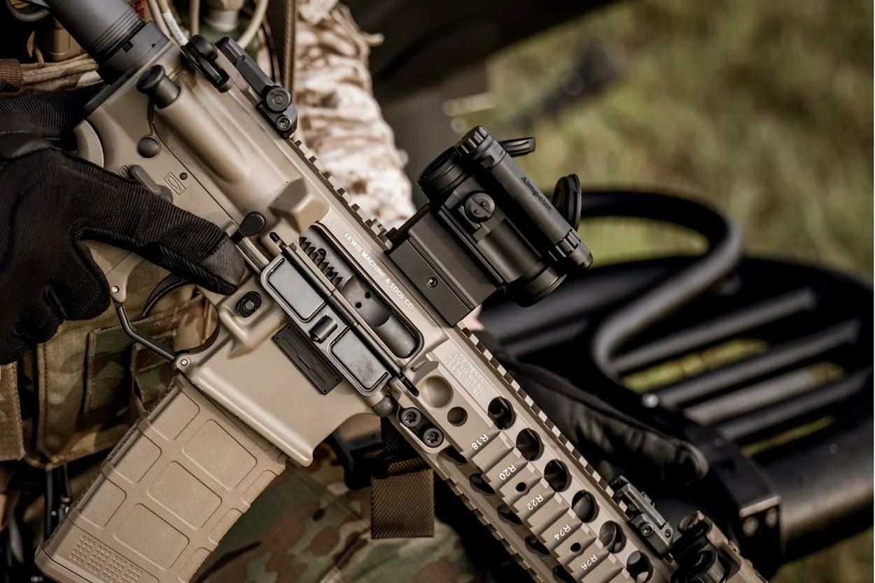 AR-15 mounted red dot optic close up