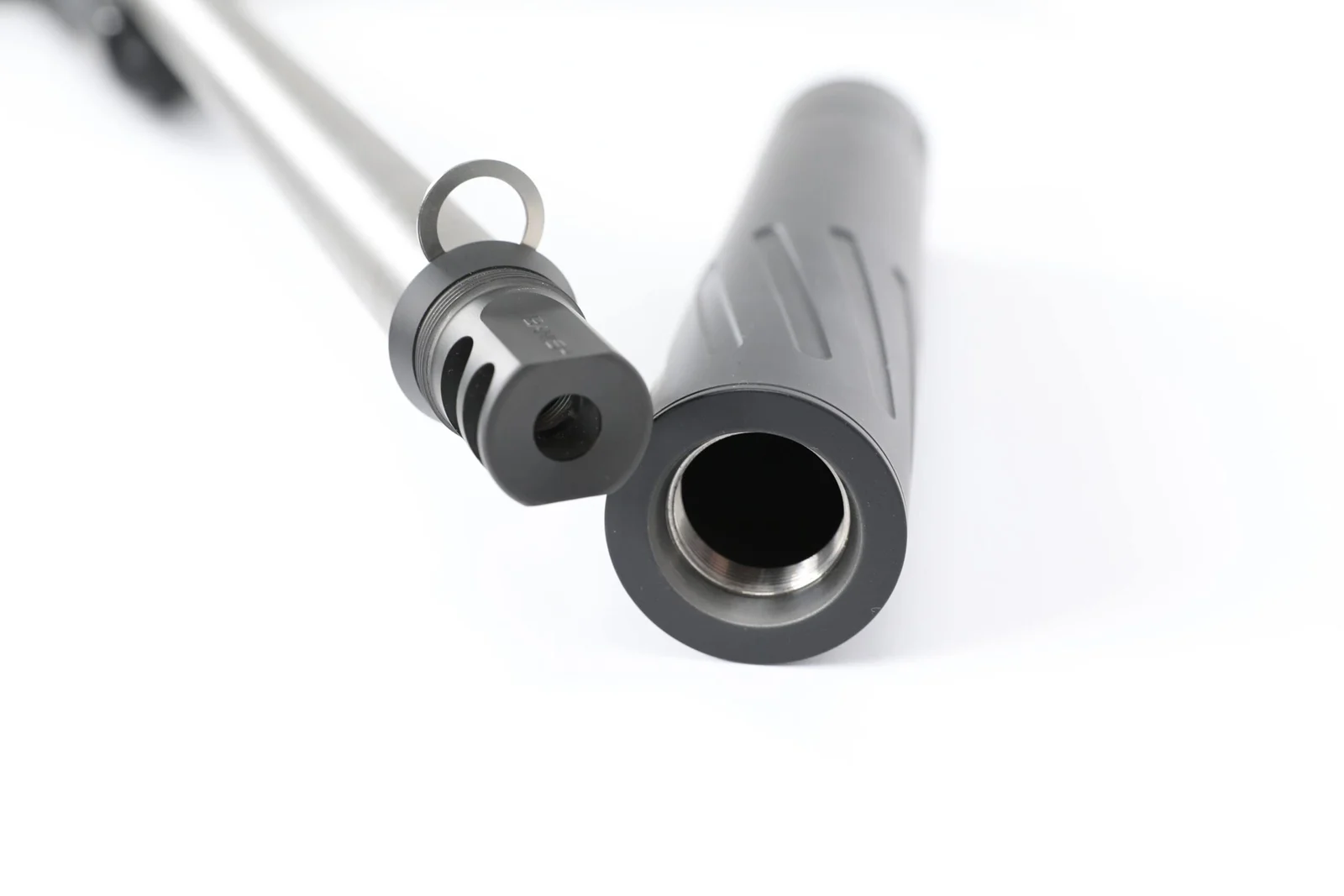 Rifle suppressor mounted on a barrel