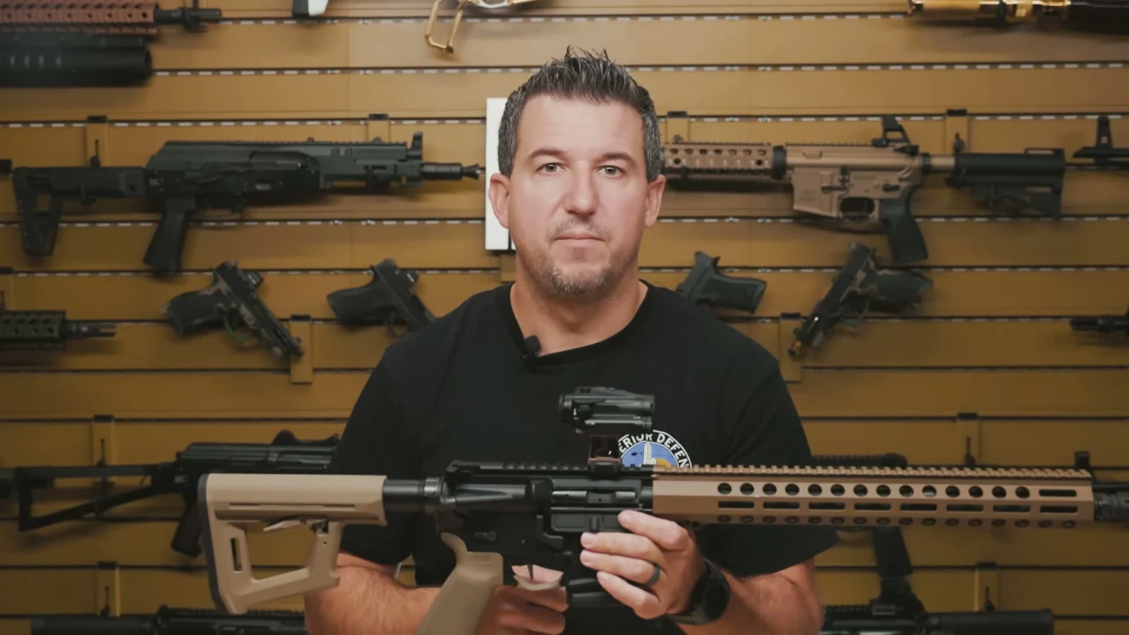 Palmetto State Armory California-configured AR-15 with black receivers, FDE Magpul furniture, and an FDE M-LOK handguard