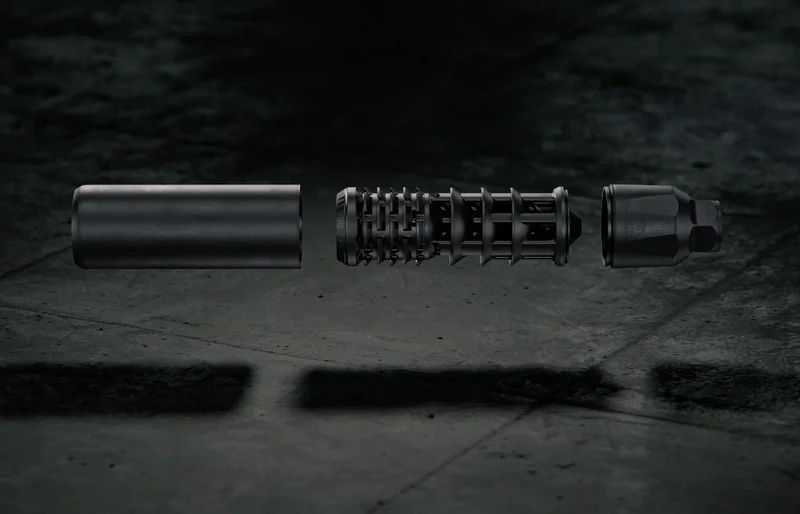 Exploded view of Q The Lefty suppressor showing the 3D printed stainless steel core with complex internal geometry