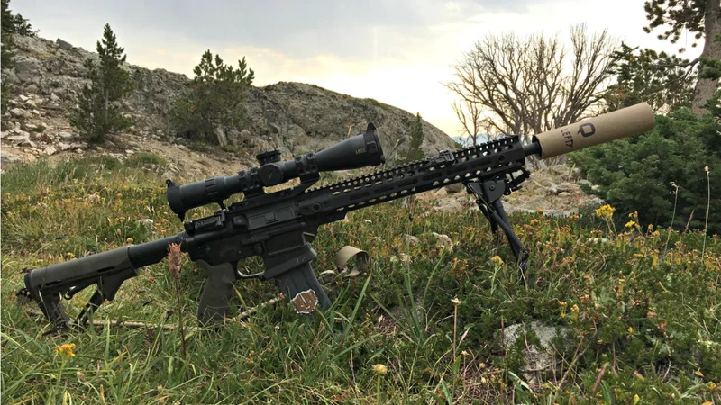 Q The Lefty suppressor mounted on a 5.56 AR-15 platform rifle showing compact profile