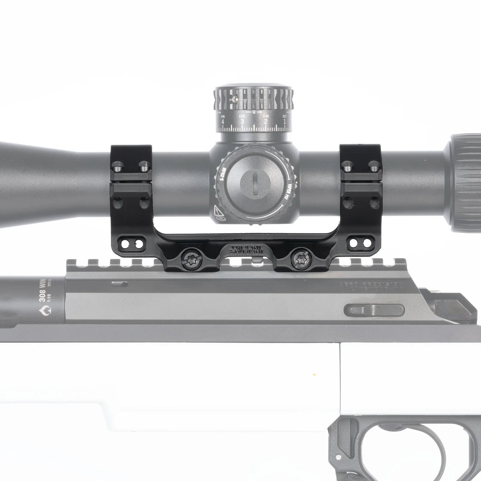 Reptilia AGS mount clamped to the Picatinny rail of a .308 Winchester bolt-action receiver, with the scope and rifle shown in grey behind it