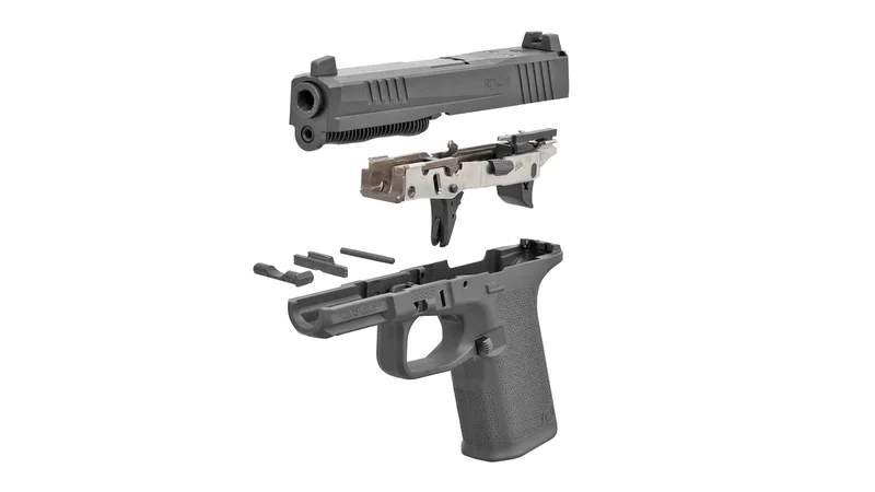 Ruger RXM pistol side profile showing the modular frame design and slide serrations